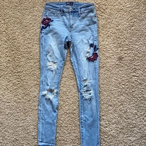 Abercrombie & Fitch Distressed Light Wash Jeans with Embroidered Floral Detail